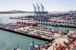 ID 6171 The Port of Auckland's general wharves. Captain Cook wharf in foreground is used mainly for the discharge of motor vehicles. Behind is Marsden Wharf and the Bledisloe Container Terminal (centre) with...